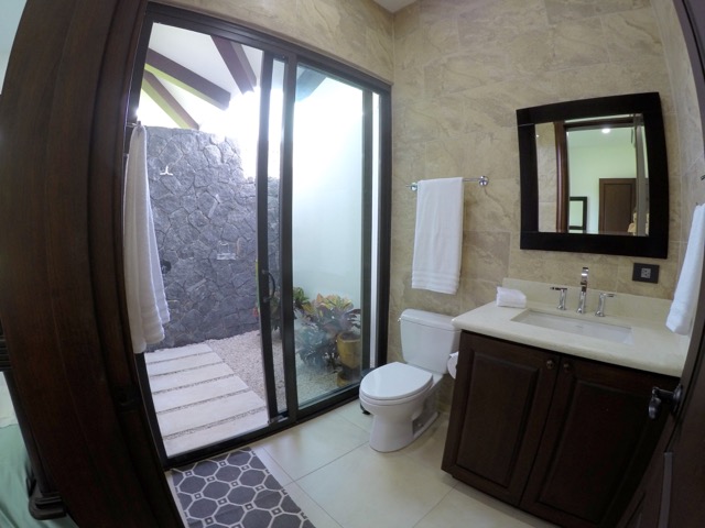 Luxury outdoor shower with Pura Vida House