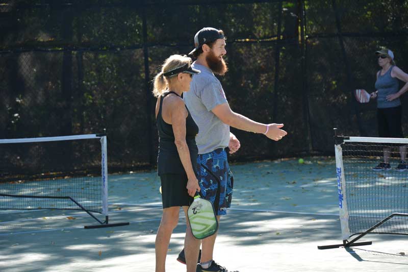photo of pickleball players on the court
